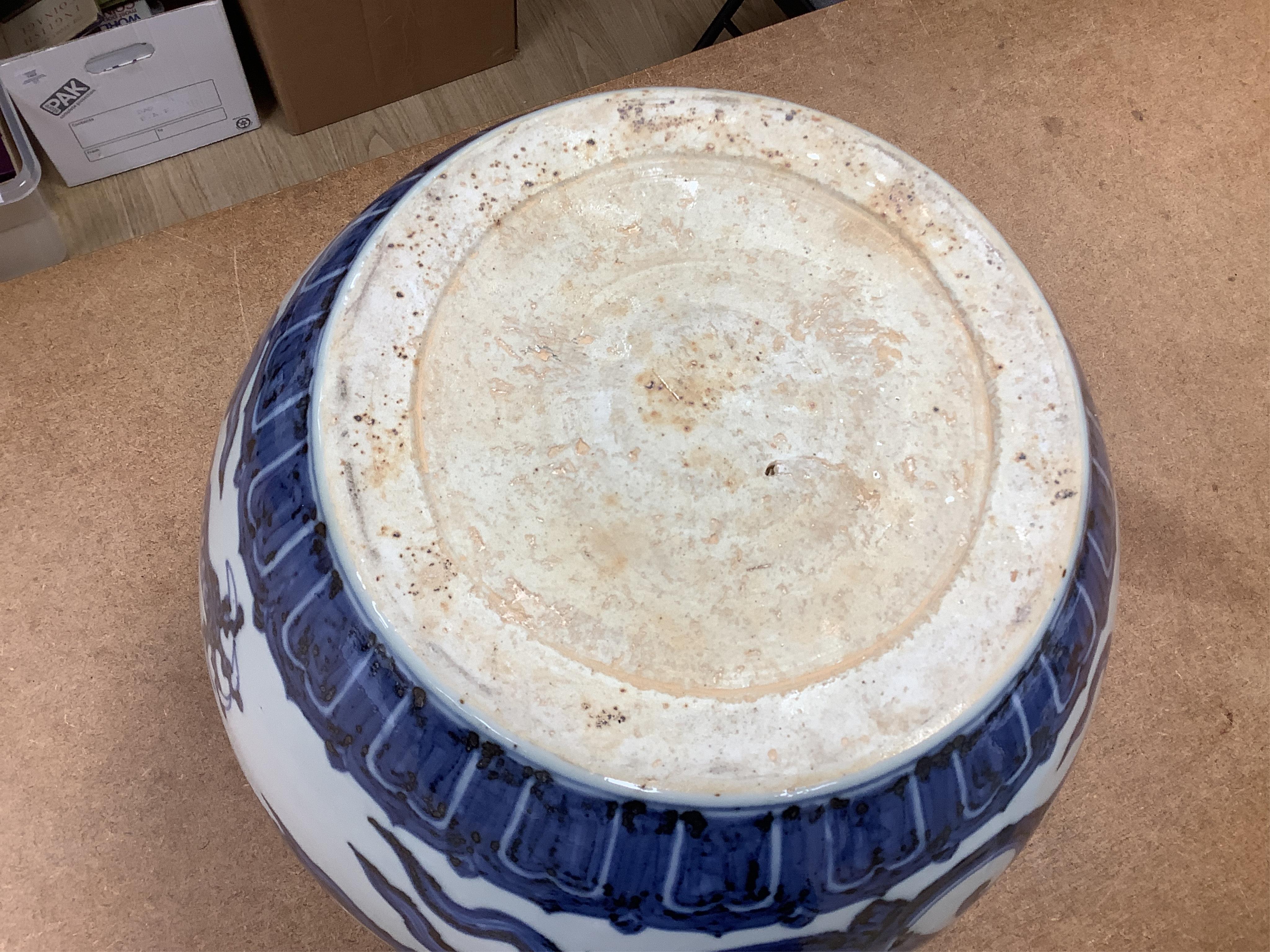 A Chinese large blue and white ‘dragon’ jar, 29cm. Condition - good